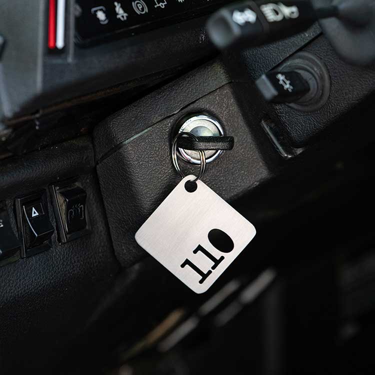DEFENDER 110 KEY RING BRUSHED BRASS OR STAINLESS STEEL